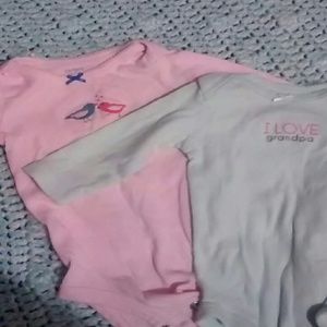 Pink and light blue long sleeve onesie.